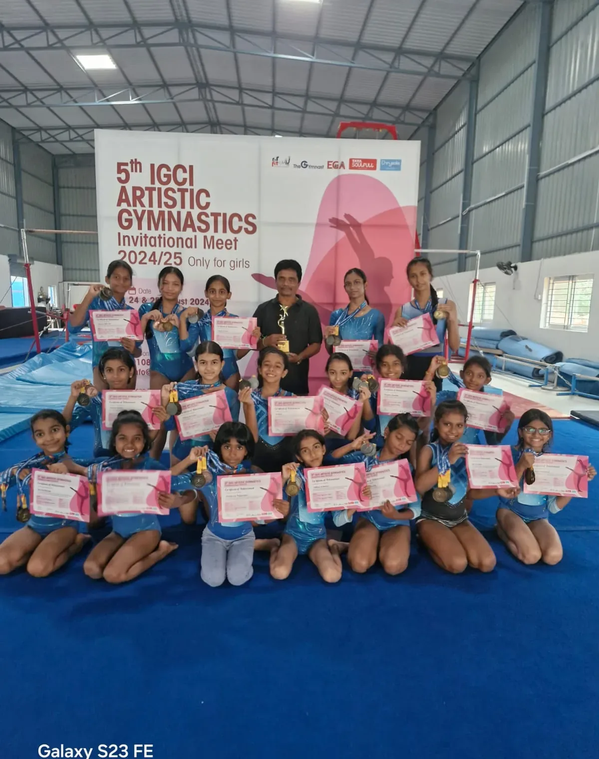 EGA gymnasts with certificates at the IGCI Artistic Gymnastics Invitational